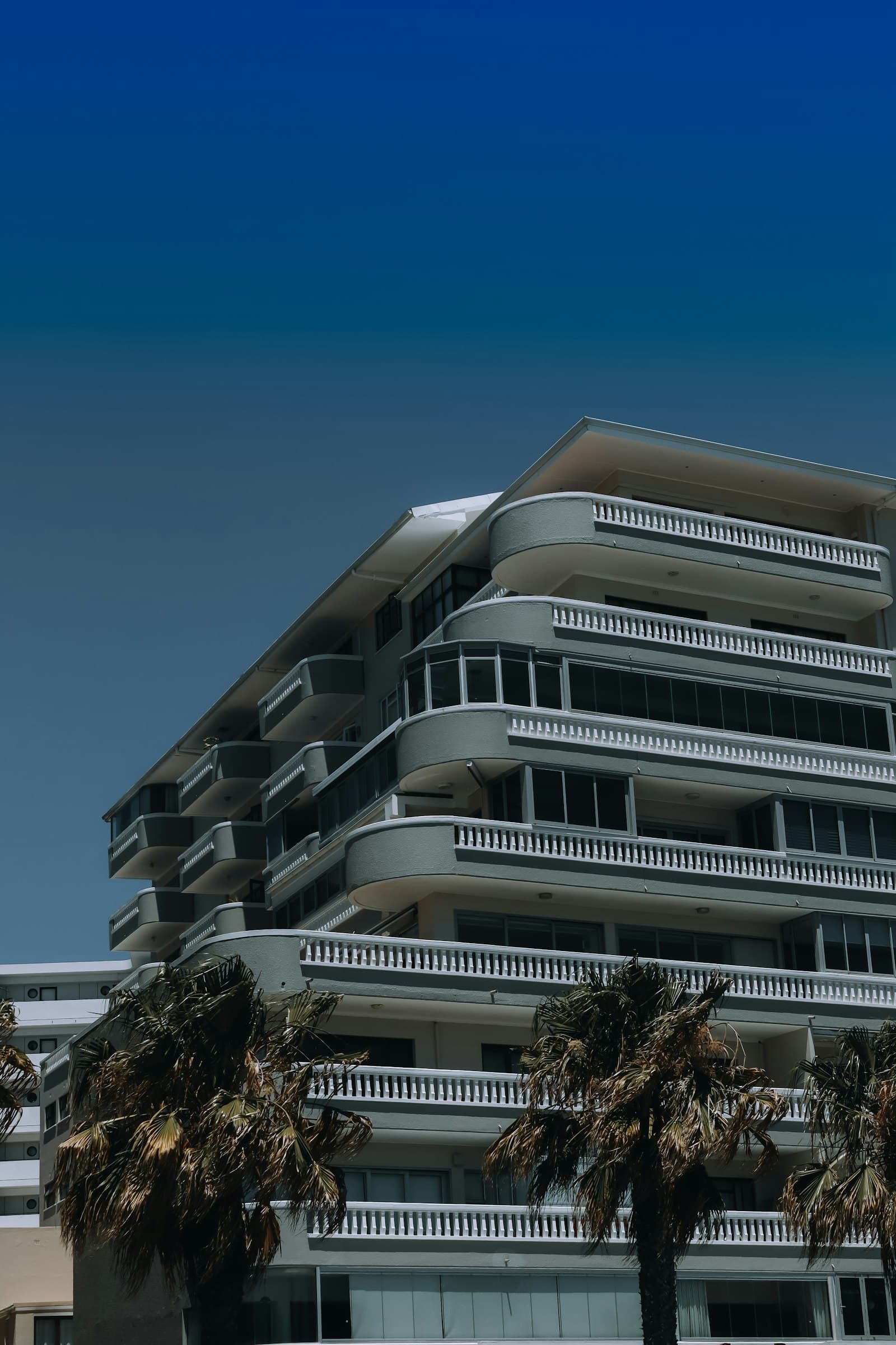 Modern high-rise building against the city skyline