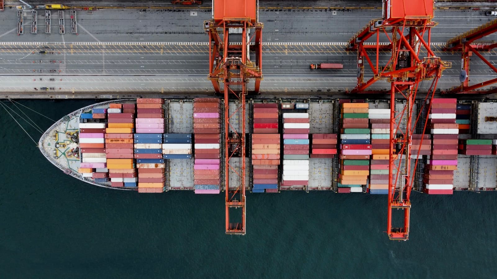 Cargo ship loaded with shipping containers at a port